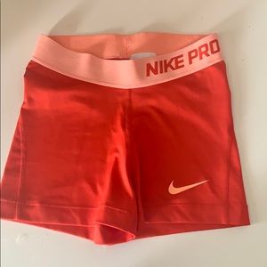 red nike pro shorts
